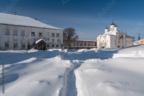 View of the Church of the Transfiguration of the Lord and the spiritual school of the Kirillo-Belozersky Monastery on a frosty sunny winter day, Kirillov, Vologda region, Russia