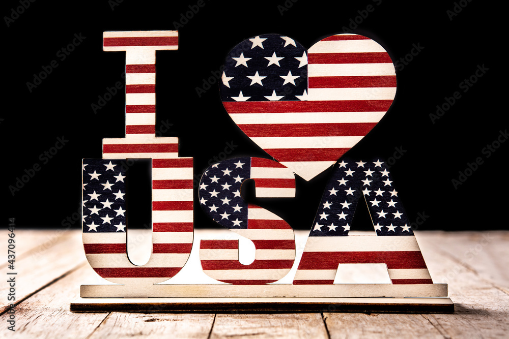 Obraz premium I love USA and stars ornament on woode table and black background