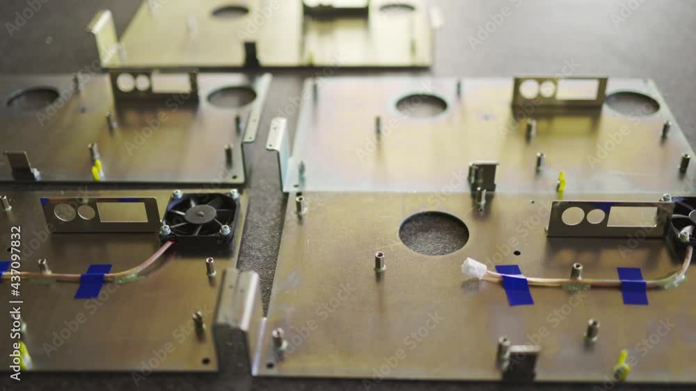 Slider shot of a blank metal components in workshop laboratory Slider shot of a blank metal components in workshop laboratory