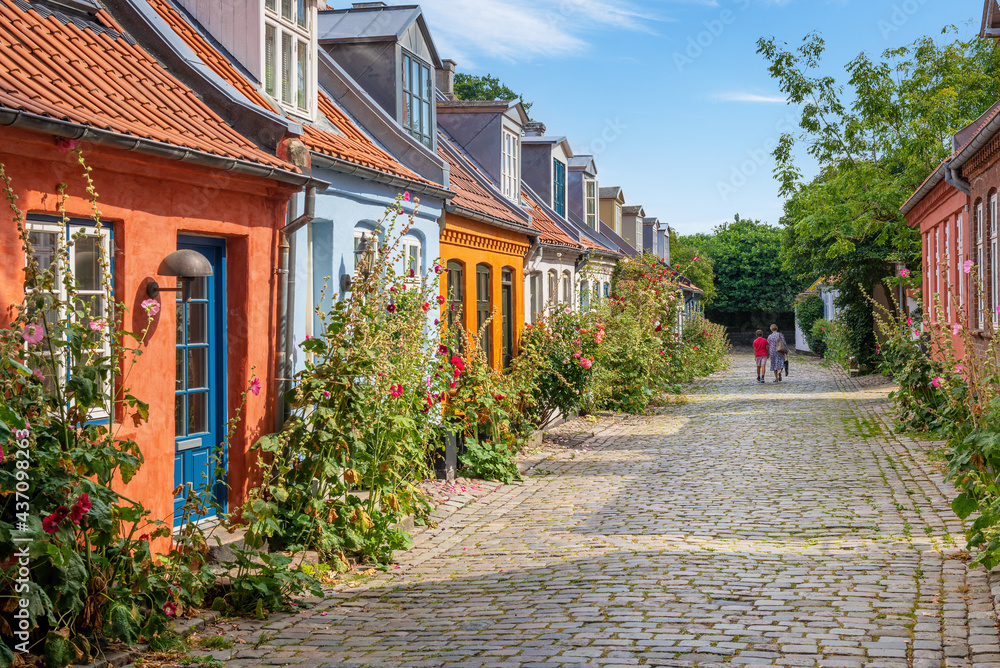 Aarhus, Denmark; May 30th, 2021 - Colourful old cottages on a quiet street in Aarhus, Denmark	
