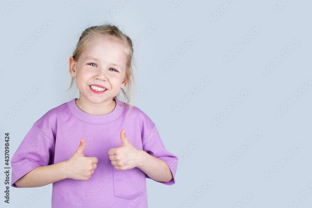 Blonde, joyful girl isolated on blue background Blonde, joyful girl isolated on blue background