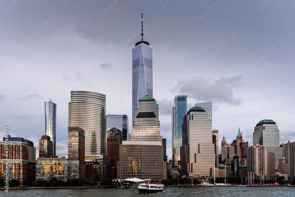 Cityscape of the Downtown of New York City at dusk. Lower Manhattan and financial district from Hudson River