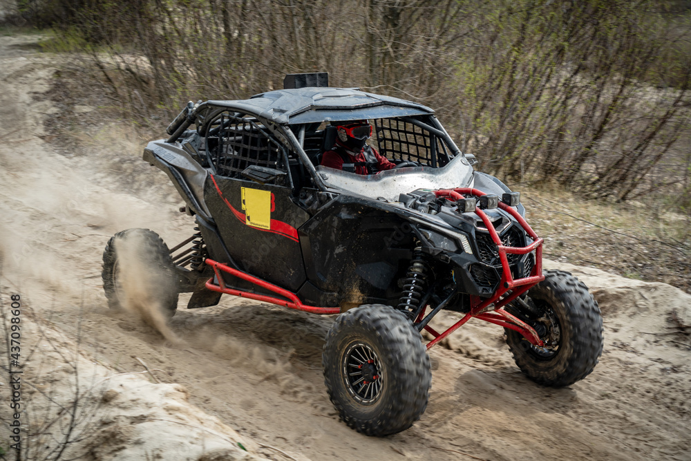 ATV, UTV hard driving over the mud off road ATV, UTV hard driving over the mud off road