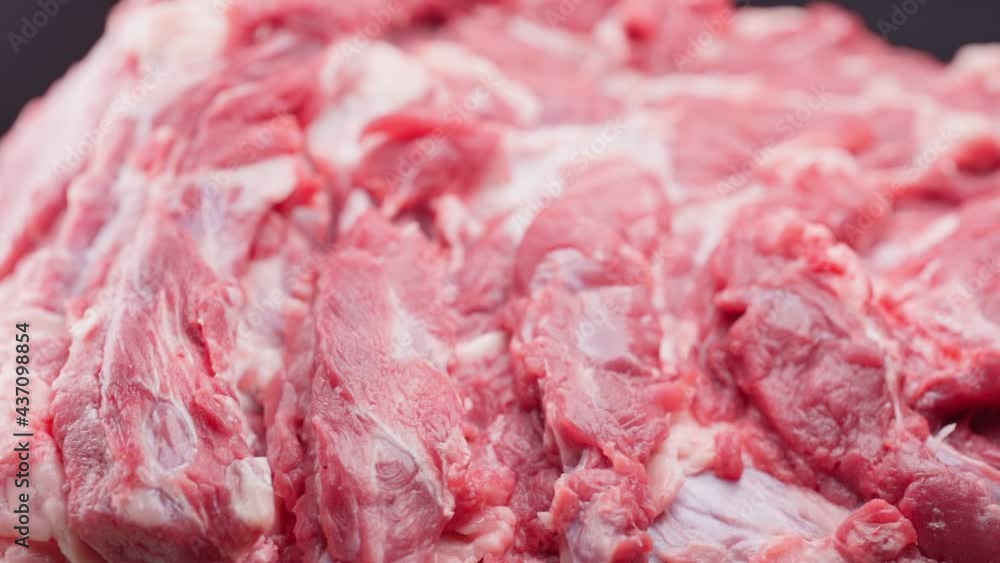 Fresh raw meat on a cutting board Fresh raw meat on a cutting board