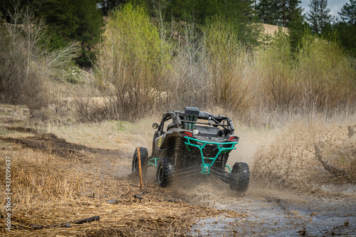 Amazing view on ATV Quad rides fast on dirt, quad racing, ATV 4x4. © Anton Tolmachov