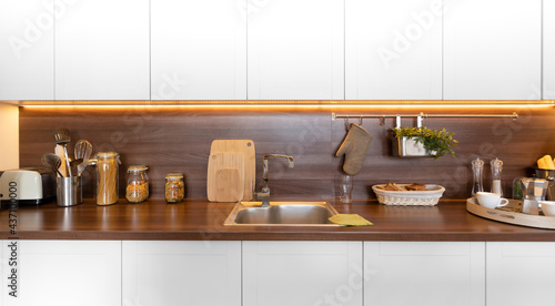 Modern bright kitchen in Art Nouveau style, in a clean interior.