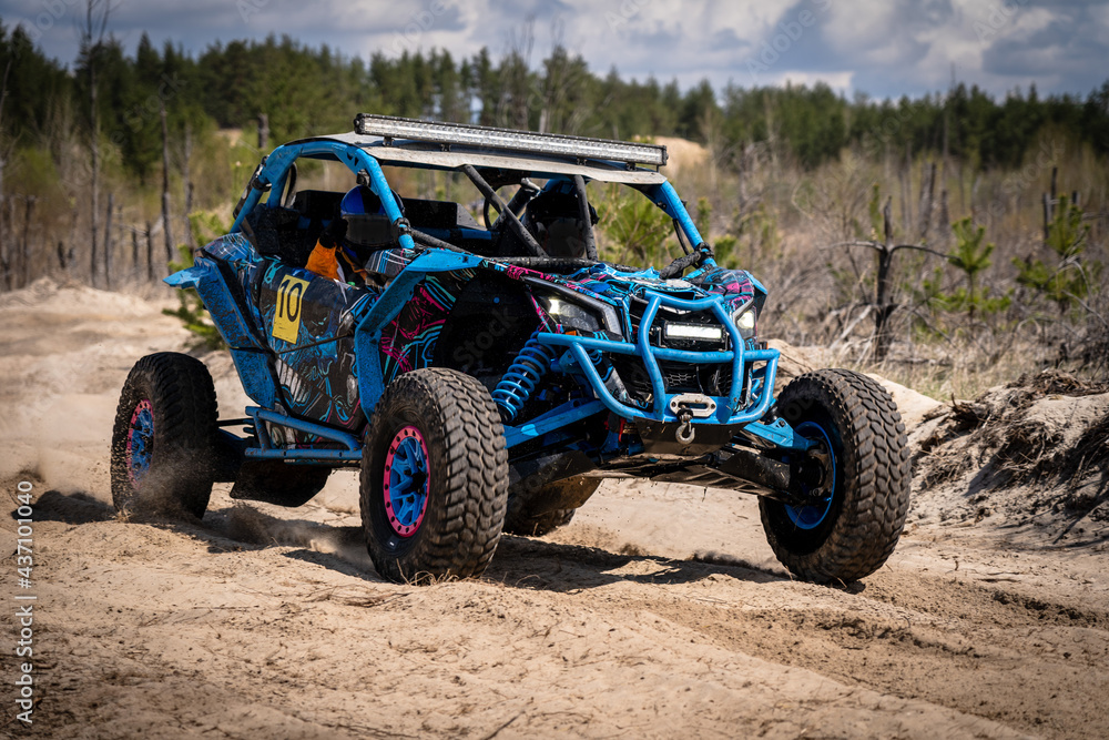 Summer UTV, ATV & offroad driving in dust. Quad racing Summer UTV, ATV & offroad driving in dust. Quad racing