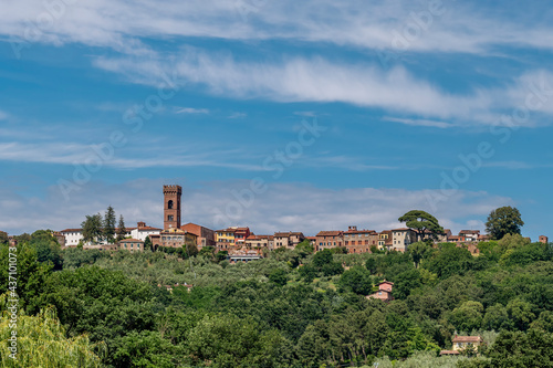 Panoramic view of the ancient Tuscan village of Montecarlo di Lucca  Italy  under a beautiful sky