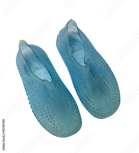 Blue swimming shoes for outdoor activities on rocky beaches, on coral or hot sand. Close-up. Isolate. White background.