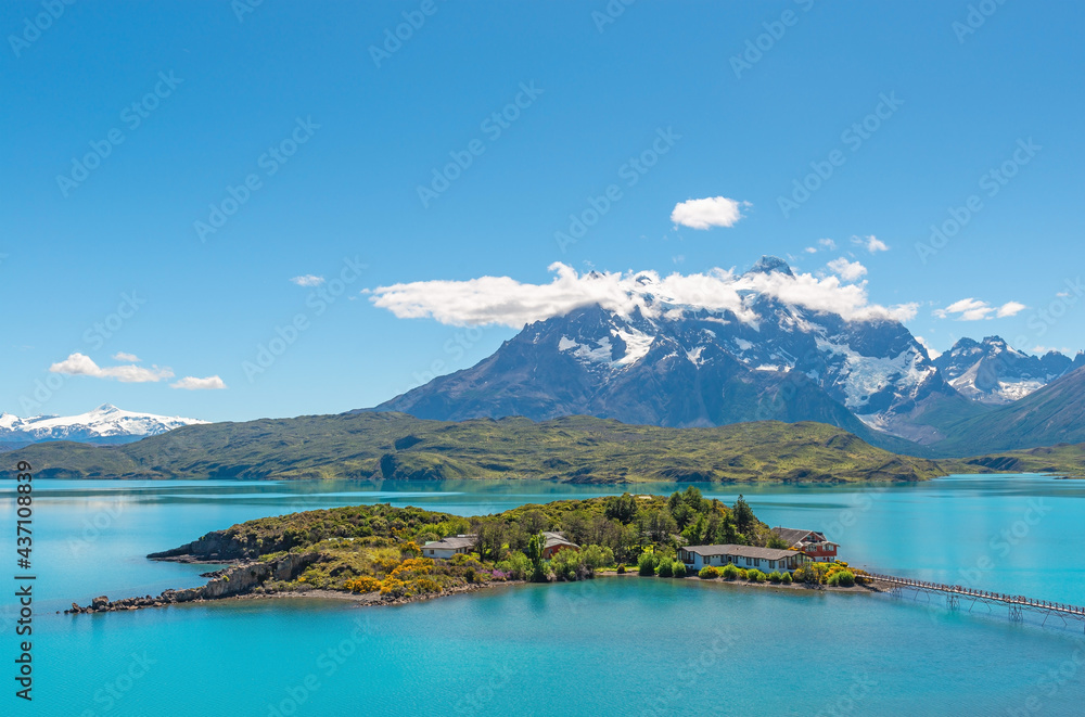 Naklejka premium Pehoe Lake with island hotel and access bridge, Torres del Paine national park, Patagonia, Chile.