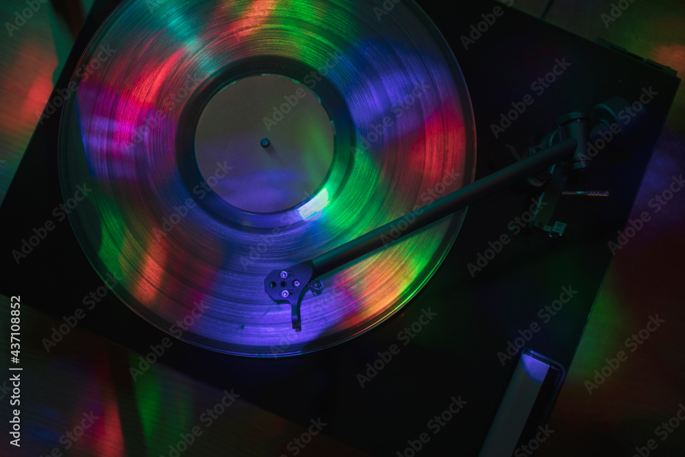 Turntable playing vinyl record at night club Turntable playing vinyl record at night club