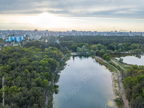 Lake in the park in spring. Aerial drone view. © Sergey