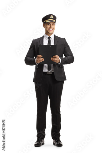 Full length portrait of a porter holding a clipboard photo