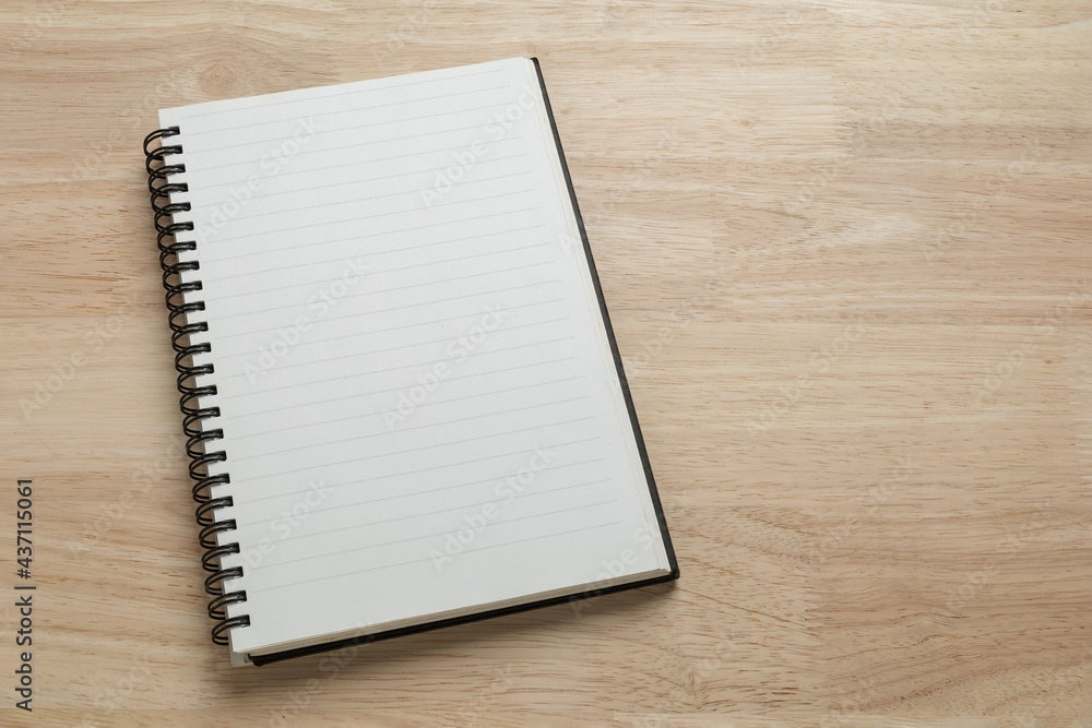 blank spiral notebook on wooden table for mockup blank template blank spiral notebook on wooden table for mockup blank template