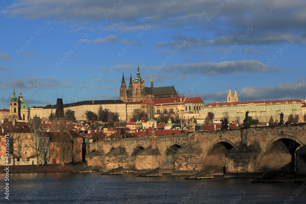Panoramic view to the Charles Bridge with 
Vitus Cathedral and castle district.