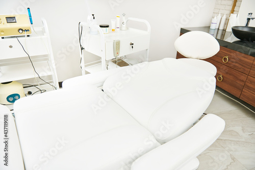 Cropped view of beauty room with comfortable massage table for spa procedures ain luxury spa clinic