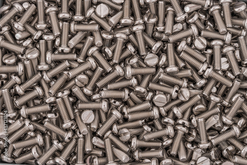 Macro photo of stainless flat head screws.