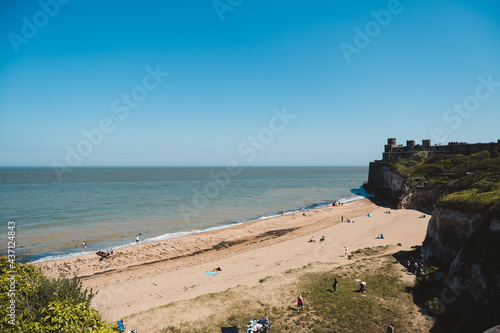 Kingsgate Castle on the top of the cliffs at the Kingsgate beach on sunny day photo