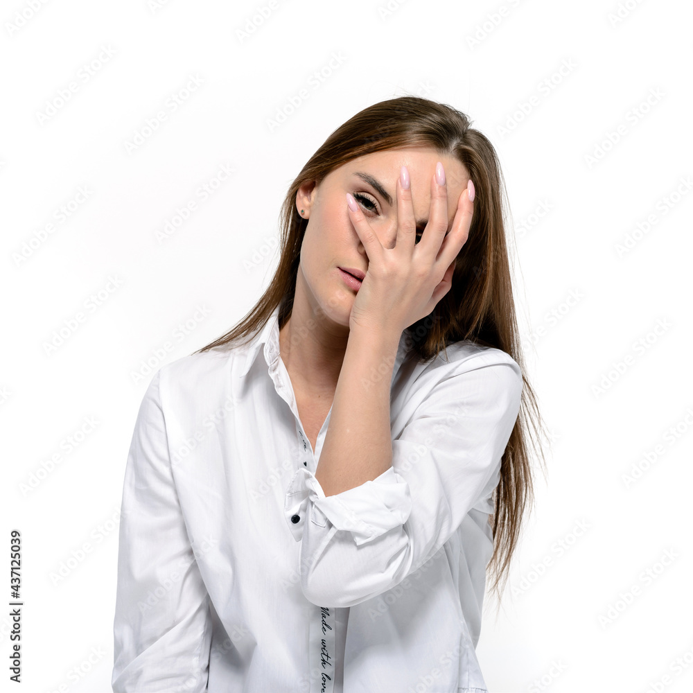 Unhappy bored young woman experiences depression, apathy and fatigue. Hand on face Unhappy bored young woman experiences depression, apathy and fatigue. Hand on face