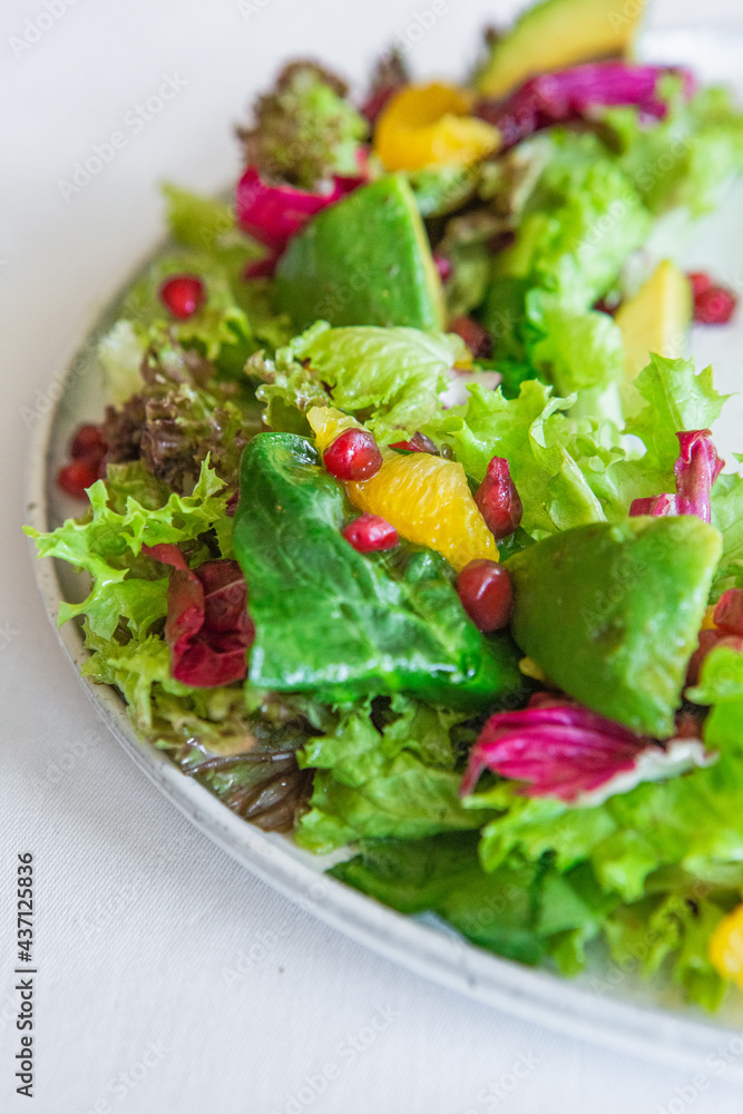 dish salad slicing fresh greens spinach avocado