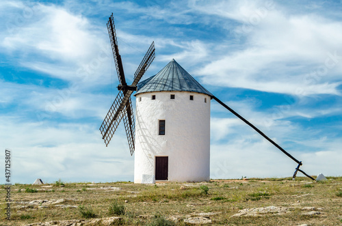 Traditional Spanish windmill in Campo de Criptana, Spain, on the famous Don Quixote Route