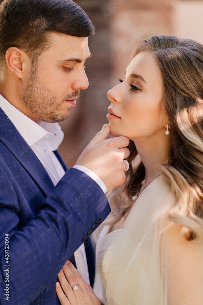 close-up portrait of the bride and groom. beautiful and romantic newlyweds. close-up portrait of the bride and groom. beautiful and romantic newlyweds.