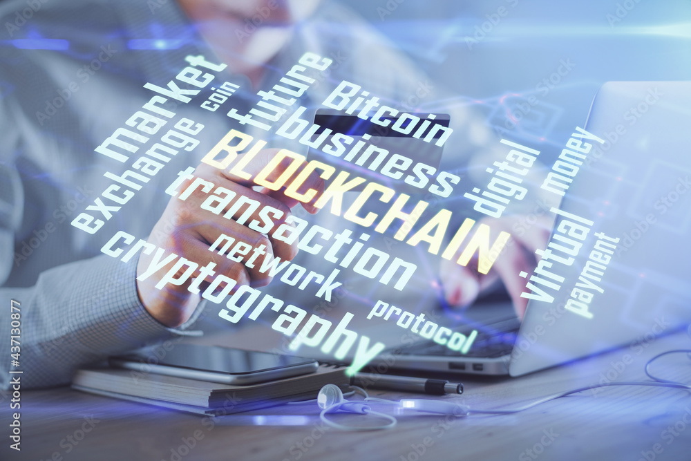Double exposure of man hands holding a credit card and crypto business theme drawing. Digital blockchain and E-commerce concept. Double exposure of man hands holding a credit card and crypto business theme drawing. Digital blockchain and E-commerce concept.