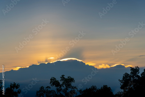 Beautiful clouds at sunrise with dramatic light. Situation in the sky in the morning. Sunrise, landscape. Image have Noise and Film Grain. Soft focus