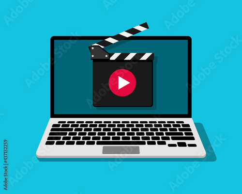 Laptop with clapper board and play button. Online cinema, movies, video content illustration.