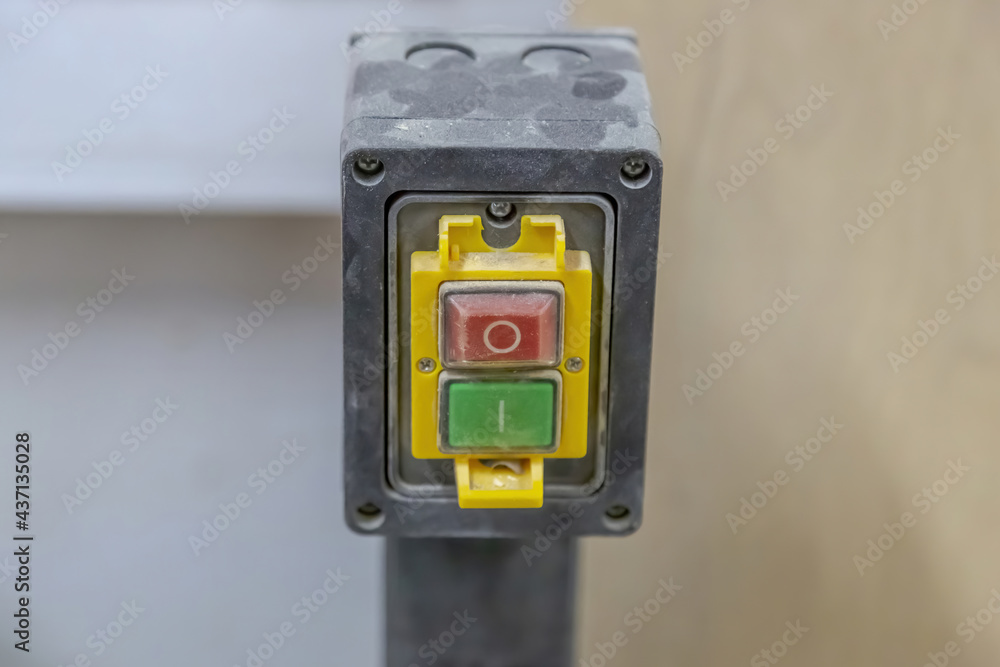 Electrical switch with buttons for turning off and on the machine and industrial equipment