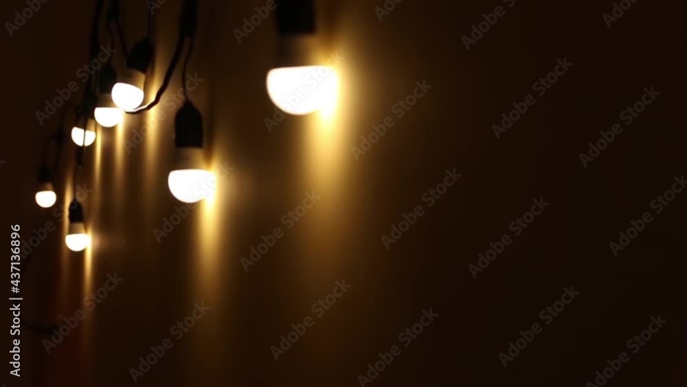row of lights in the dark in row lining street row of lights in the dark in row lining street
