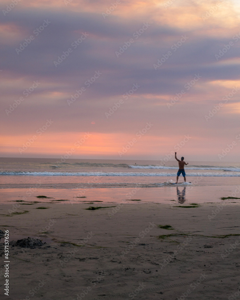 person running on the beach at sunset person running on the beach at sunset