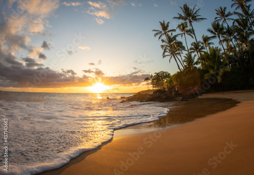 Sunset on a beach in Maui © Drew
