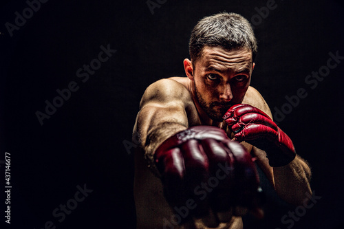 MMA Fighter with boxing gloves photo