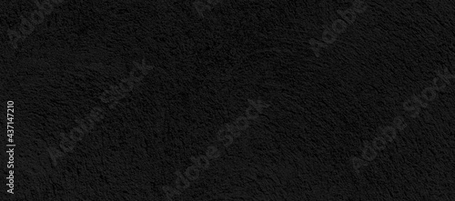 Panorama of Cement wall painted black with rough lines texture and background seamless