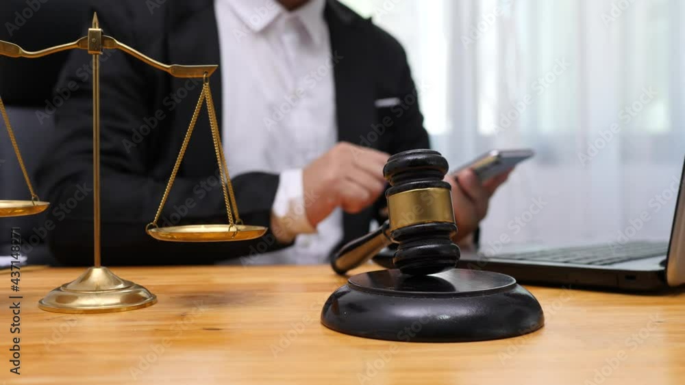 Consult Judge or lawyer Hand Writing Document in Court Room. Consult Judge or lawyer Hand Writing Document in Court Room.