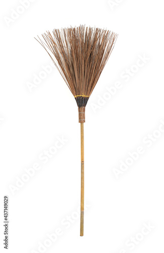 Broom made from coconut stick isolated on white background