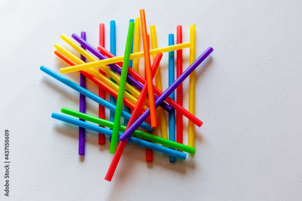 Mixed color of single use plastic straw on white background. Mixed color of single use plastic straw on white background.