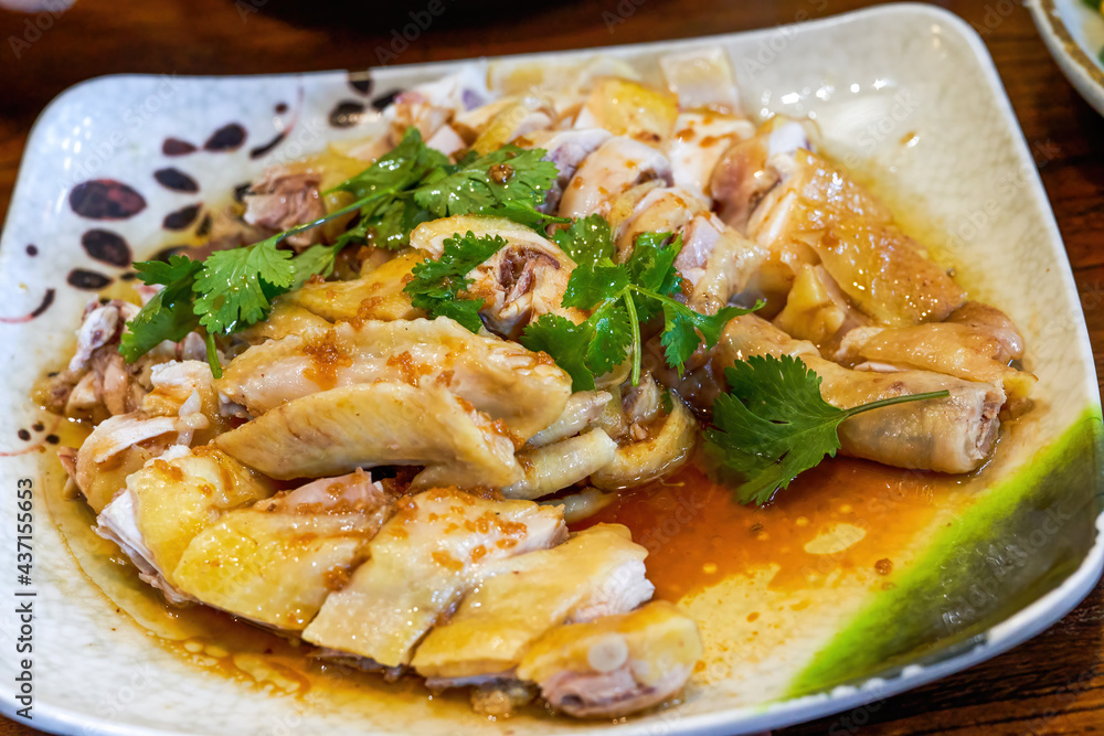 A delicious classic Cantonese dish, white-cut chicken in soy sauce A delicious classic Cantonese dish, white-cut chicken in soy sauce