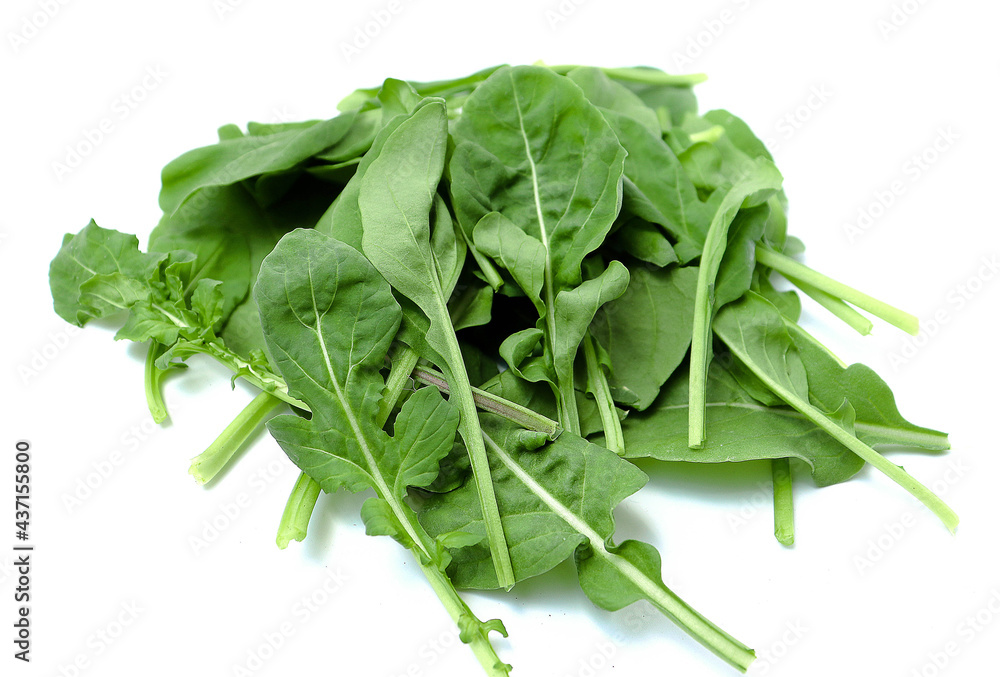 fresh green arugula isolated on white background. Organic vegetable fresh green arugula isolated on white background. Organic vegetable