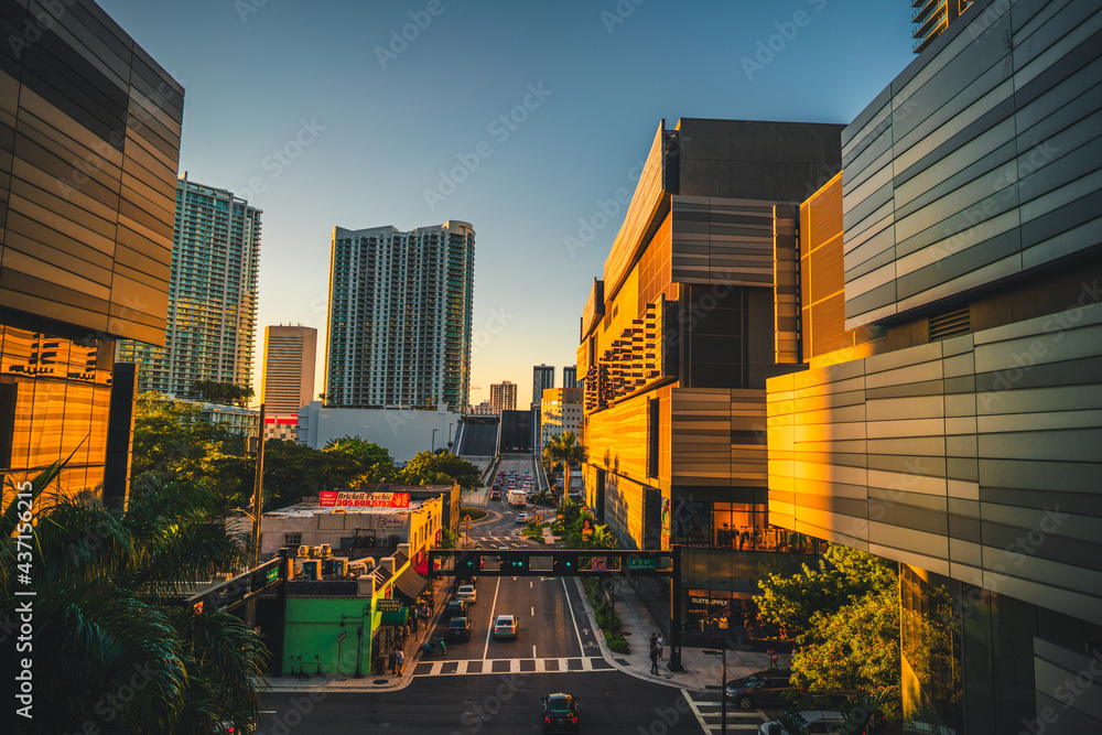 downtown city at sunset reflection sun Brickell miami florida usa sky buildings street road people life 