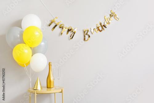 Table with bottle of champa...