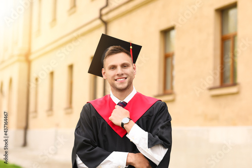 Portrait of male graduating...