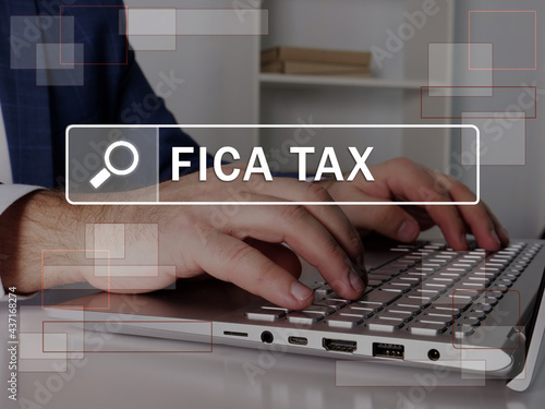  FICA TAX Federal Insurance Contributions Act text in search line. Broker looking for something at computer. FICA TAX Federal Insurance Contributions Act concept. photo