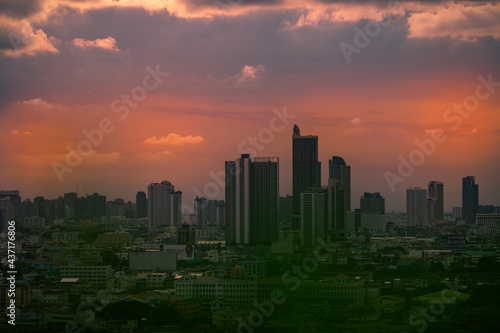 Wallpaper High angle of the city view with the secret light of the evening sun the blurred lights of the night showing the distribution of condominiums  densely residential houses in the capital