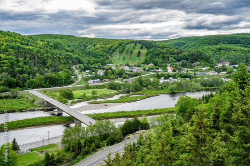 View from the Belvedere des Deux Riviere on Matapedia. a small tow of Quebec (Canada) on a cloudy summer day