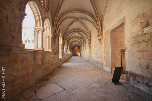Archway of an old monastery. Cloisters of Batalha Monastery. Batalha Portugal, © nvphoto