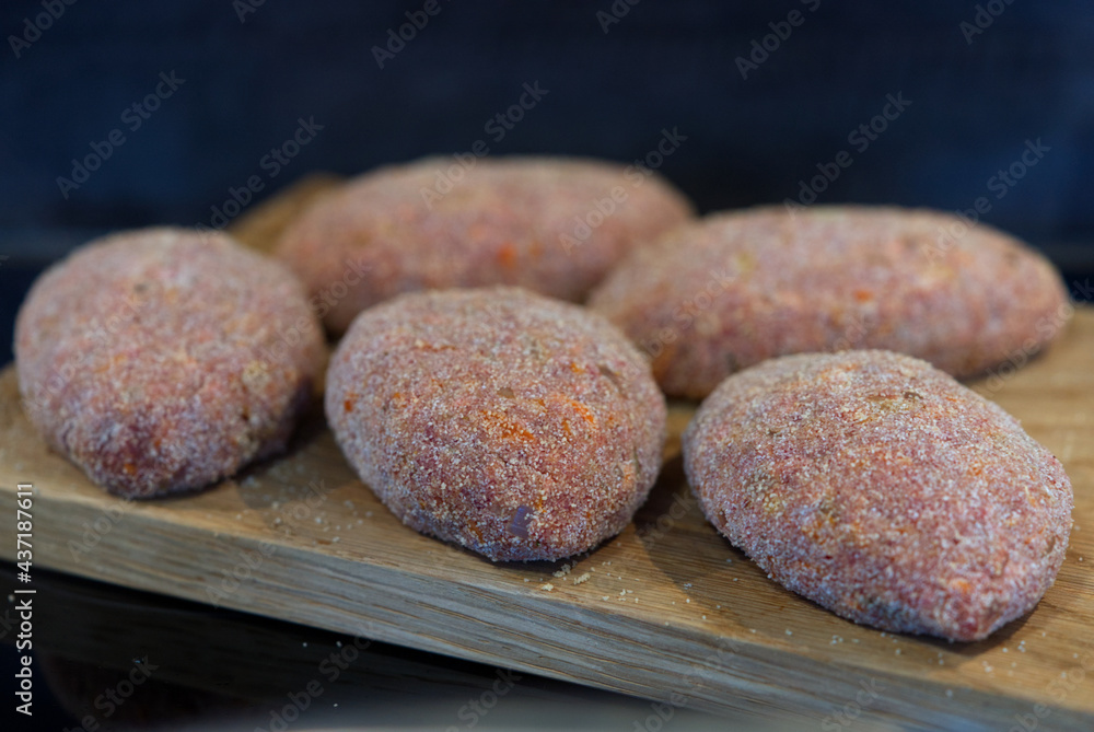 cutlets on the wooden plate. ground meat cutlet cutlets on the wooden plate. ground meat cutlet