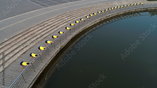 Photography Women practice yoga by the river in the park, aerial photos, North China