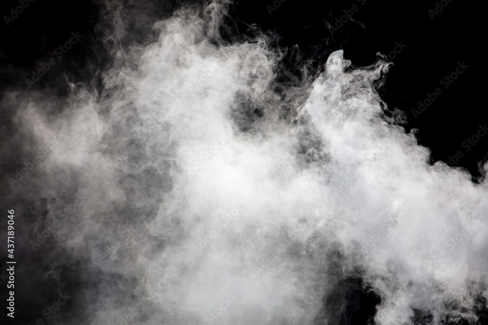 Fototapeta premium White smoke on a black background. Texture